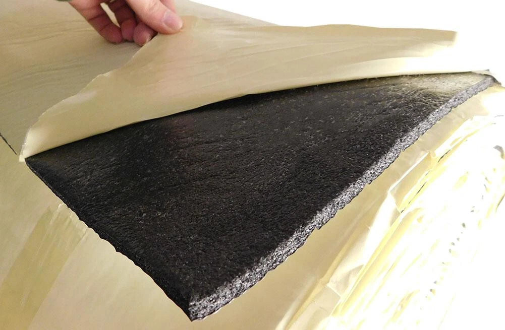 Peel and stick automotive sound deadener with heat reflective insulation backing